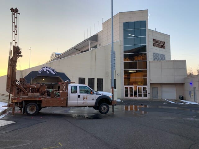 MATECO Drilling geotechnical drilling truck in front of Waldo Stadium