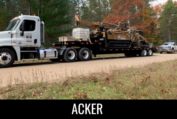 Acker Drill loaded onto a MATECO drilling truck